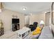 Inviting living room featuring contemporary decor, a large TV, a sofa and natural light at 6041 Laurent Ave, Fort Mill, SC 29715