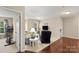 Comfortable living room with dark hardwood floors, a neutral rug, and recessed lights at 6041 Laurent Ave, Fort Mill, SC 29715