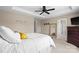 Comfortable main bedroom with natural light, a tray ceiling, and ample space at 6041 Laurent Ave, Fort Mill, SC 29715