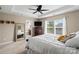 Comfortable main bedroom with natural light, a tray ceiling, and ample space at 6041 Laurent Ave, Fort Mill, SC 29715