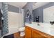 Bathroom with a shower, vanity, mirror, and a blue shower curtain in a home at 636 Sadler Glen Dr, Charlotte, NC 28214
