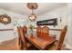 Beautiful dining room with modern fireplace and elegant table set, perfect for Gathering gatherings at 636 Sadler Glen Dr, Charlotte, NC 28214
