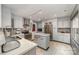 Stylish kitchen with stainless steel appliances, a central island, and sleek white cabinetry at 636 Sadler Glen Dr, Charlotte, NC 28214