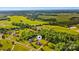 Picturesque neighborhood with homes nestled among trees and expansive fields, offering a serene and rural setting at 6713 Edwards Farm Ln, Monroe, NC 28110