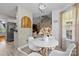 Charming dining area with round table adjacent to the kitchen at 6713 Edwards Farm Ln, Monroe, NC 28110