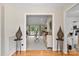 Inviting foyer opens to spacious living area with hardwood floors and ample natural light at 6713 Edwards Farm Ln, Monroe, NC 28110