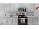Charming kitchen with stainless appliances, and updated countertops at 6713 Edwards Farm Ln, Monroe, NC 28110