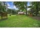 Large backyard perfect for outdoor activities featuring play set and gazebo at 7531 Linda Lake Dr, Charlotte, NC 28215