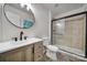 Modern bathroom features a new vanity with a vessel sink and glass door shower at 7531 Linda Lake Dr, Charlotte, NC 28215
