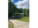 Charming two-story home with well-manicured lawn and long driveway at 7531 Linda Lake Dr, Charlotte, NC 28215