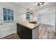 Charming kitchen featuring black cabinets, wood counters, and stainless appliances at 7531 Linda Lake Dr, Charlotte, NC 28215