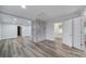Spacious living room with an accent wall, and views of multiple rooms at 7531 Linda Lake Dr, Charlotte, NC 28215