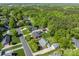 Expansive aerial view of the property showcasing its desirable neighborhood, lush landscaping, and curb appeal at 806 Mcgregor Ne Dr, Concord, NC 28025