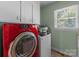 Bright laundry room with modern washer and dryer and ample natural light at 806 Mcgregor Ne Dr, Concord, NC 28025