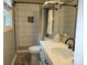 Modern bathroom featuring a sleek, tiled shower with stylish fixtures and a well-lit vanity at 854 Silver Fox Dr, Concord, NC 28025