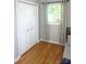 This bedroom boasts hardwood floors, a double door closet, and a sunlit window at 854 Silver Fox Dr, Concord, NC 28025