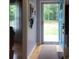 Inviting entryway features a bright blue front door and hardwood flooring at 854 Silver Fox Dr, Concord, NC 28025