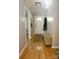 Inviting entryway with gleaming hardwood floors, neutral paint, and a charming accent bench at 854 Silver Fox Dr, Concord, NC 28025