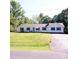 Traditional-style house with black shutters, a green lawn, and a quaint front porch area at 854 Silver Fox Dr, Concord, NC 28025