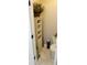 Cozy half bathroom featuring tiled floors, toilet, cabinet with storage and decorative accents at 854 Silver Fox Dr, Concord, NC 28025