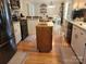 Open kitchen layout with granite countertops, white cabinets, and modern appliances at 854 Silver Fox Dr, Concord, NC 28025
