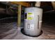 Water heater inside the crawl space, with visible maintenance records and energy guide at 854 Silver Fox Dr, Concord, NC 28025