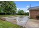 Expansive backyard featuring a basketball court, trampoline, and ample space for outdoor activities at 101 Wynnchester Rd, Gastonia, NC 28056