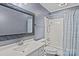Bathroom with a shower and tub combination, gray walls, and a large framed mirror at 101 Wynnchester Rd, Gastonia, NC 28056