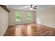 Sun-filled bedroom with wood flooring and neutral paint at 101 Wynnchester Rd, Gastonia, NC 28056