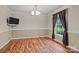 Comfortable dining room with hardwood floors, and natural light from a side-facing window at 101 Wynnchester Rd, Gastonia, NC 28056