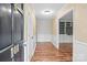 Inviting entryway featuring gleaming hardwood floors, fresh paint, and an open view to the home's living spaces at 101 Wynnchester Rd, Gastonia, NC 28056