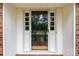 Exterior view of the front door featuring sidelights, glass panel, and house number at 101 Wynnchester Rd, Gastonia, NC 28056