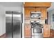 Eat-in kitchen features stainless steel appliances, granite countertops, and ample cabinet space at 101 Wynnchester Rd, Gastonia, NC 28056