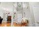 Grand foyer with hardwood floors, soaring ceilings, and elegant architectural details at 1011 Master Gunner Ct, Indian Trail, NC 28079