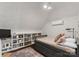 Cozy bedroom with built-in shelving and a daybed at 107 Waterhouse Ct, Mooresville, NC 28117