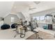 Bright exercise room with windows, gym equipment, and beanbag chairs at 107 Waterhouse Ct, Mooresville, NC 28117