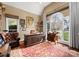 Spacious office with large windows and wood desk at 107 Waterhouse Ct, Mooresville, NC 28117