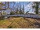 Backyard with a lush lawn and a privacy fence, ideal for outdoor activities and relaxation at 121 York St, Chester, SC 29706