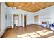 Bedroom featuring unique coffered ceilings and ensuite bathroom, offering charm and convenience at 121 York St, Chester, SC 29706