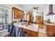 Open kitchen featuring a center island, wooden cabinets, and plenty of counter space at 121 York St, Chester, SC 29706