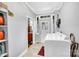 Functional laundry room with tile flooring, offering convenience and organization at 121 York St, Chester, SC 29706