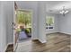 Inviting foyer with hardwood floors, leading into a dining area bathed in natural light at 1218 Faversham Ln, Rock Hill, SC 29730