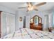 Spacious bedroom featuring a ceiling fan and antique wooden dresser at 1260 Summer Ln, Salisbury, NC 28146