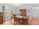 Charming dining area with natural light, seating for six, and convenient access to the outdoor patio at 1260 Summer Ln, Salisbury, NC 28146