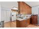 Well-lit kitchen featuring modern appliances, light countertops, and ample storage space at 1260 Summer Ln, Salisbury, NC 28146