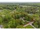 Aerial view highlighting the property's wooded lot and surrounding neighborhood, offering a peaceful, secluded atmosphere at 174 Buffalo Creek Dr, Statesville, NC 28677