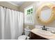 Bathroom features include a shower/tub combo and ample natural light at 174 Buffalo Creek Dr, Statesville, NC 28677