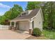 One car detached garage with an attached covered area great for outdoor entertaining at 174 Buffalo Creek Dr, Statesville, NC 28677