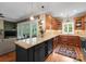 Spacious island kitchen features breakfast bar and stainless appliances at 174 Buffalo Creek Dr, Statesville, NC 28677