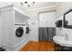 Modern laundry room with built-in storage and sink at 174 Buffalo Creek Dr, Statesville, NC 28677
